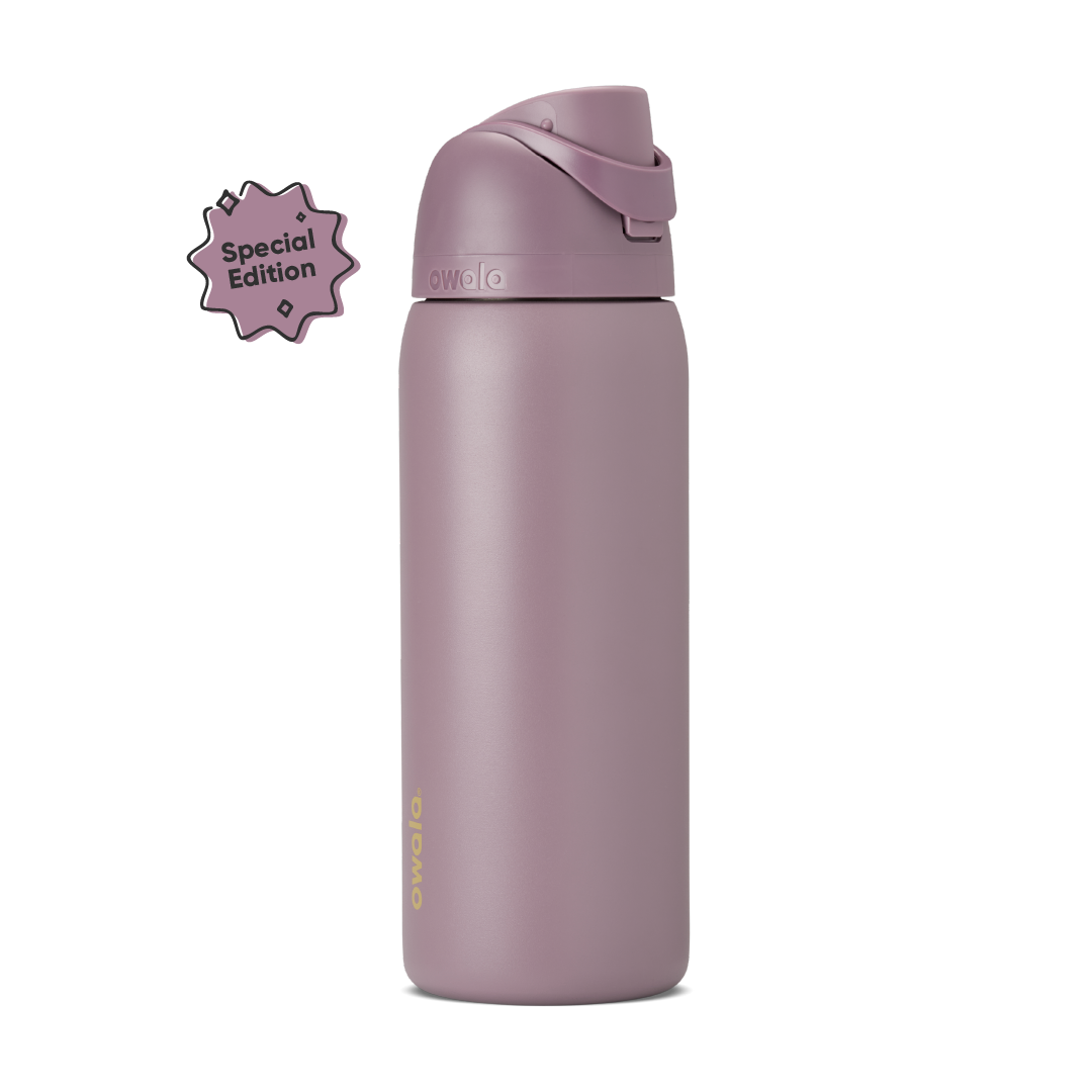 FreeSip 32oz in Spring Revival, dusty mauve-purple insulated bottle with matching flip cap and carry loop, gold Owala logo